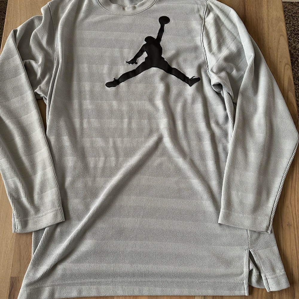 Air Jordan long sleeve shirt.  Color is gray and is size large.